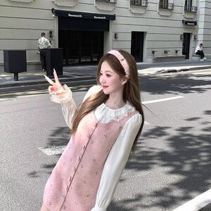 Elegant Pink Sleeveless Dress with White Blouse